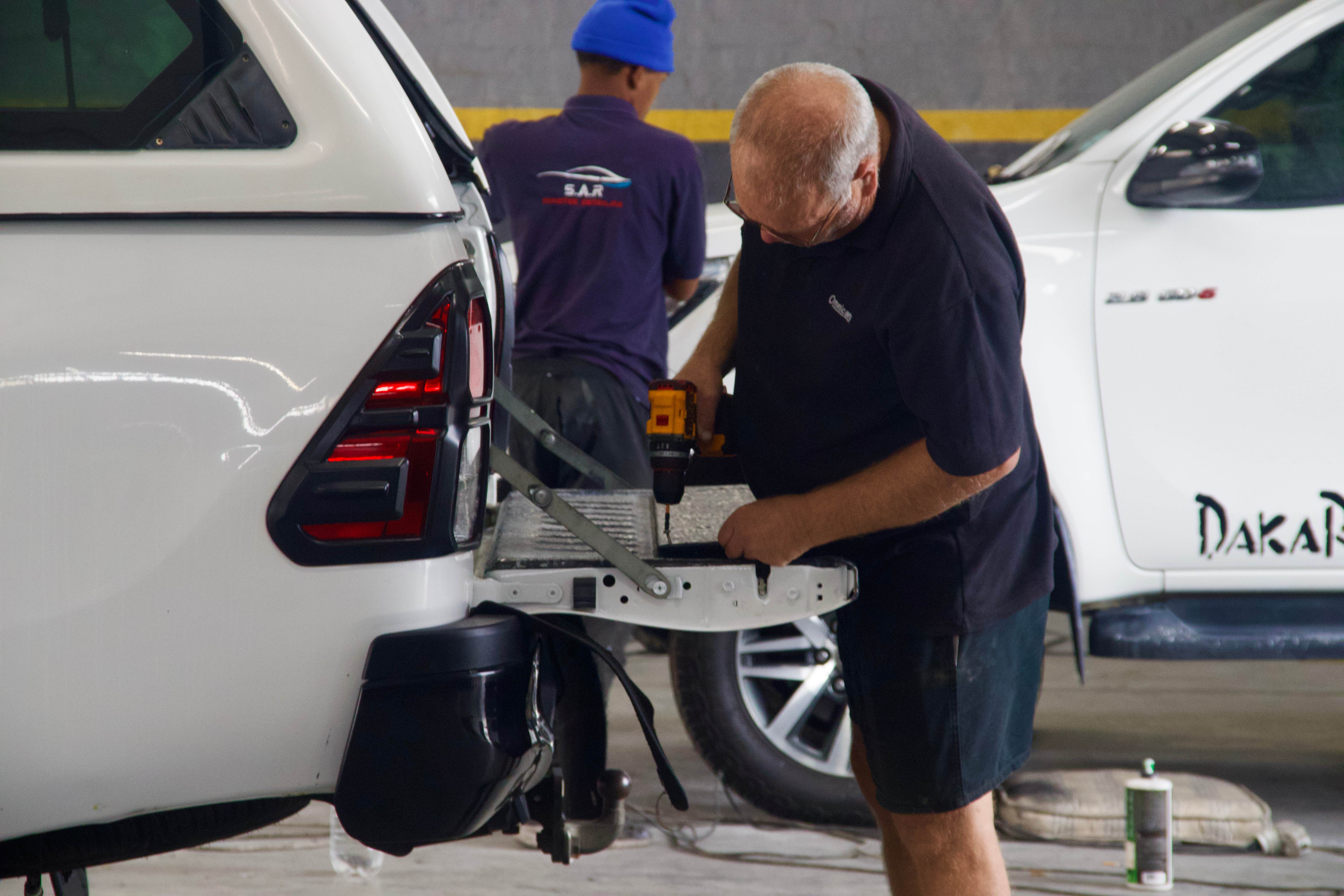 Ride Revive technicians working on a vehicle